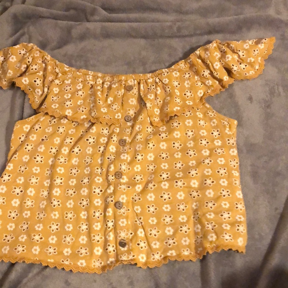 Nice orangey yellow blouse new worn once I never really had anywhere to wear it.